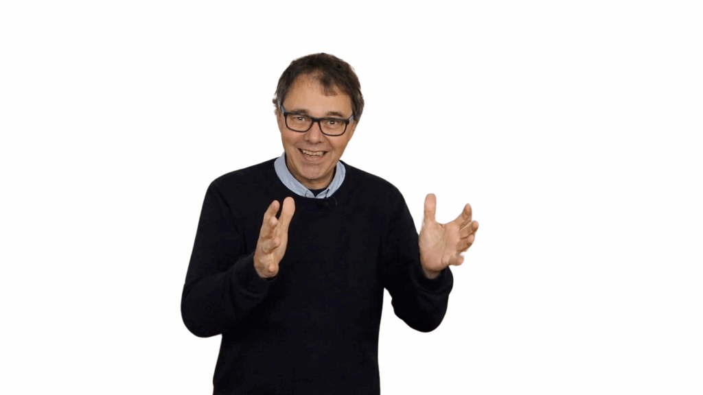 obert Jautschus steht lächelnd mit ausgebreiteten Armen – ein offenes, motivierendes Willkommensbild auf der Presseseite.