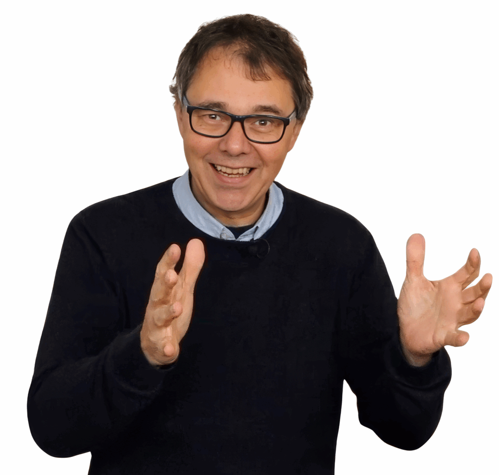 Robert Jautschus lächelt herzlich in die Kamera und heißt Besucherinnen und Besucher seiner Website willkommen.